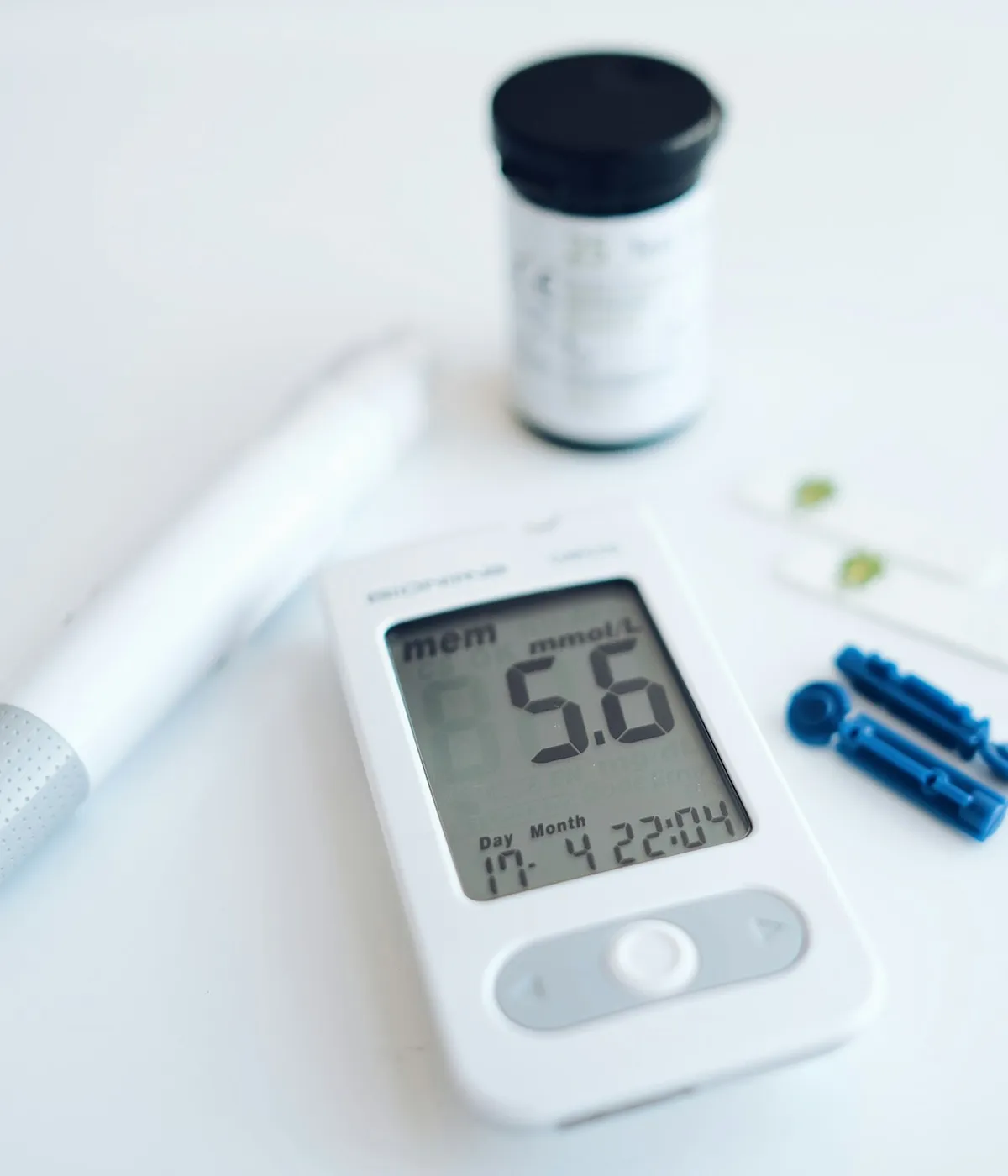 A blood glucose meter with a lancing device and test strips